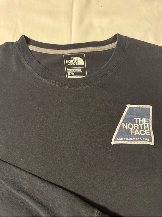 The North Face Other - The North Face Black Long Sleeve Tee with Blue Logo Patch